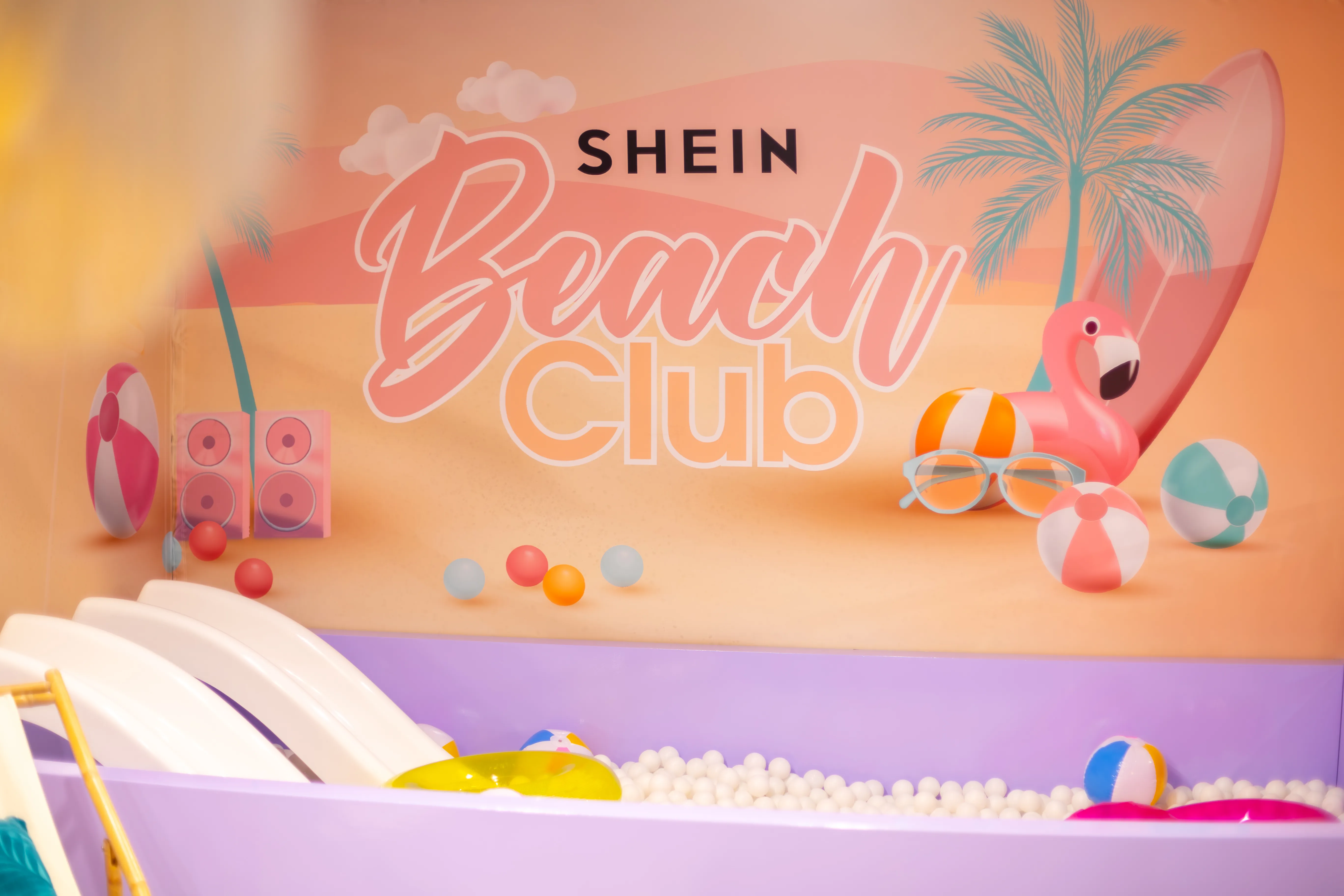 SHEIN Beach Club mural closeup — logo detail